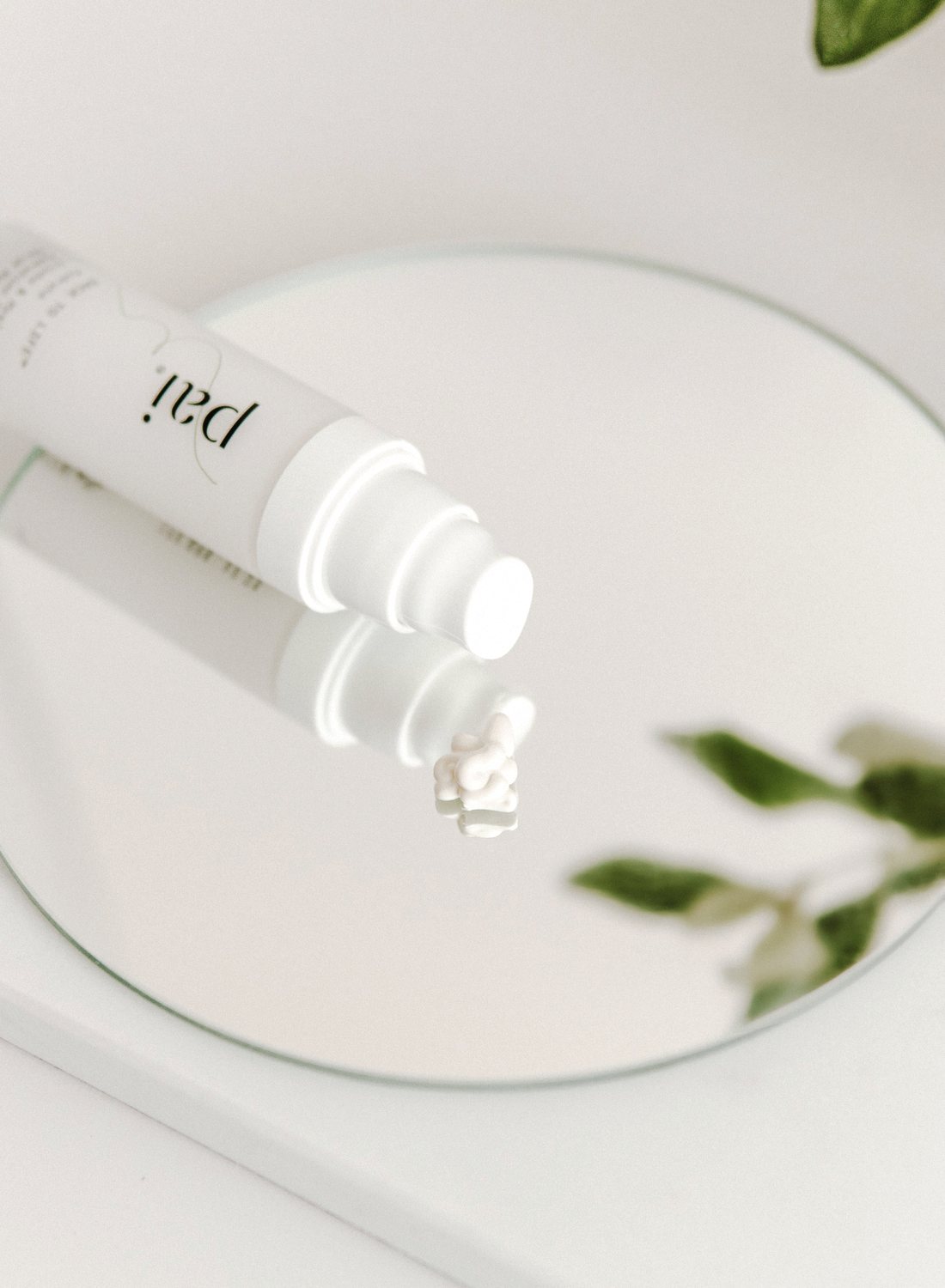 Skincare cream texture on a mirror